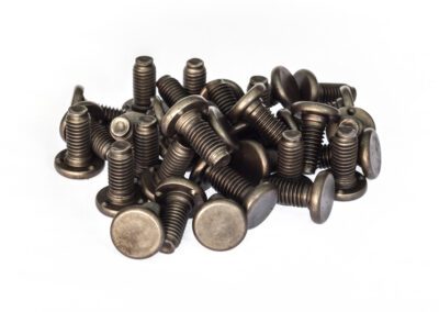 A pile of metal bolts